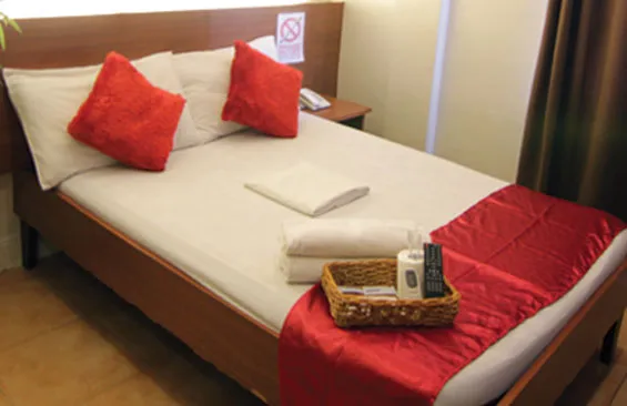 Furnished guest room at Gran Prix.