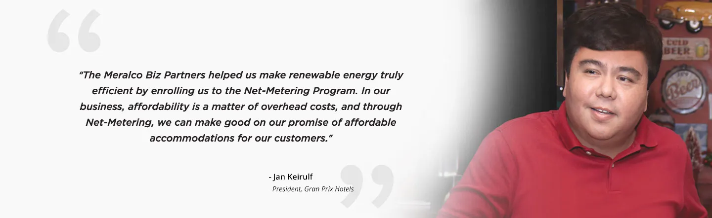 Gran Prix representative beside his solar energy testimonial.