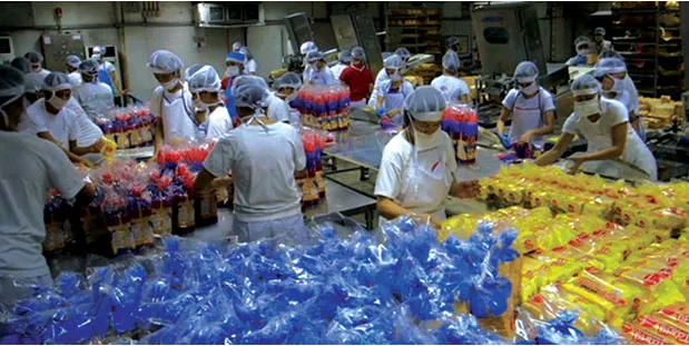 Marby employees prepare packaged products.
