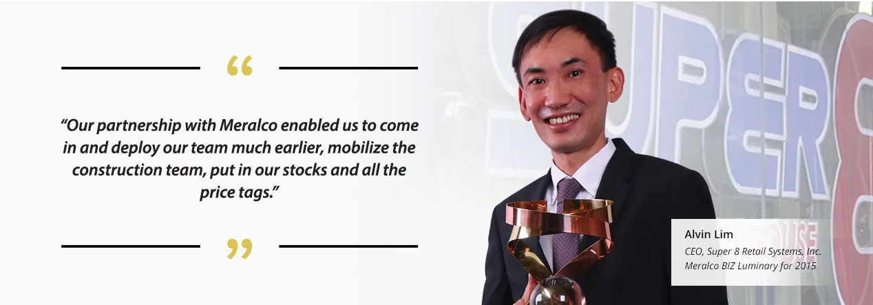Super 8 representative beside his customer testimonial.