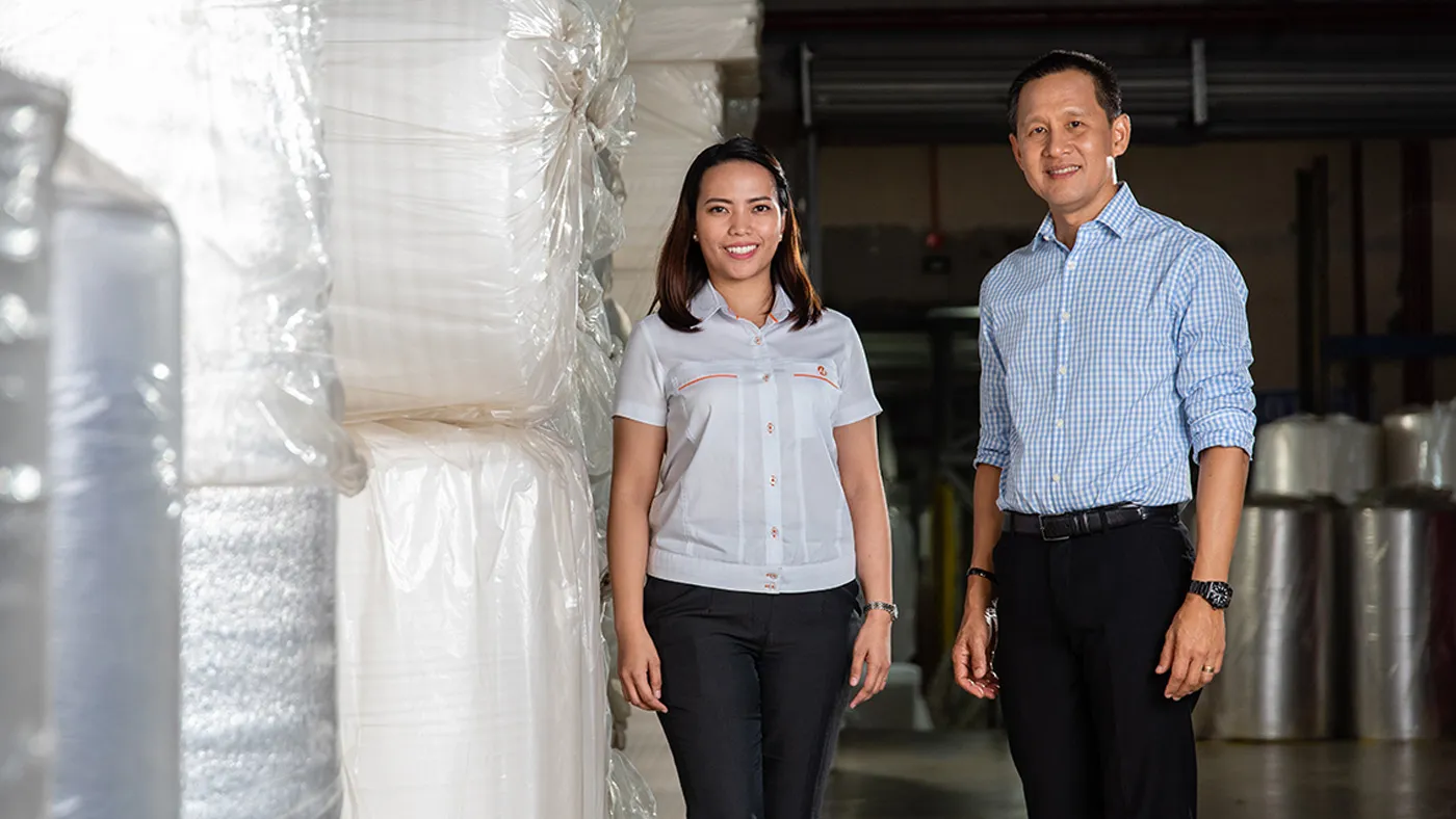 Betafoam representatives at the production facility.