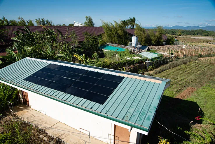 Solar panels on a roof at GK Enchanted Farm.