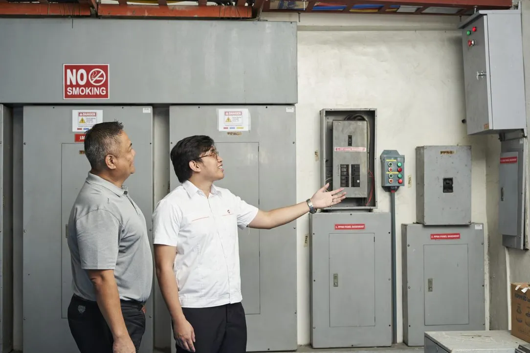 Representatives inspect electrical equipment at Orchard.