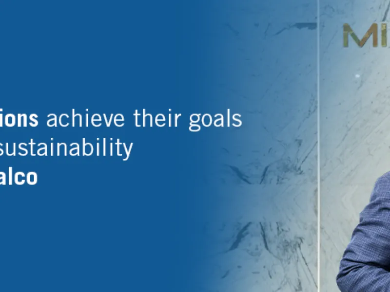 Mirax and Rima representative beside the company’s sustainable development message.