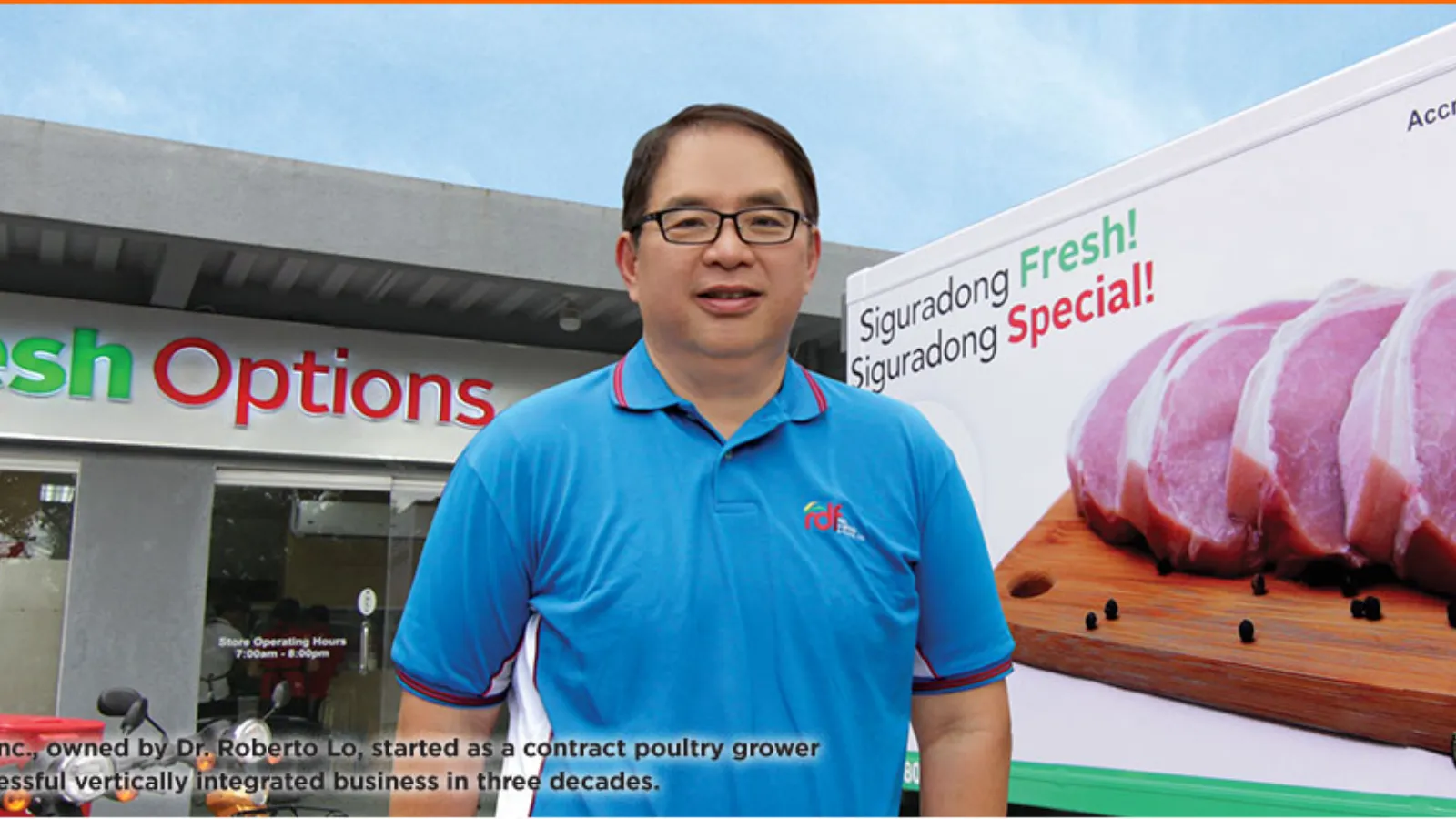 Fresh Options representative in front of a delivery truck.