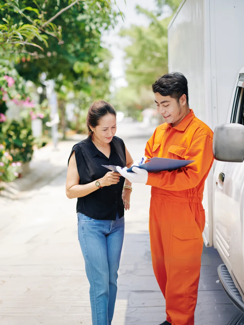A Meralco specialist supports a customer at a service center.