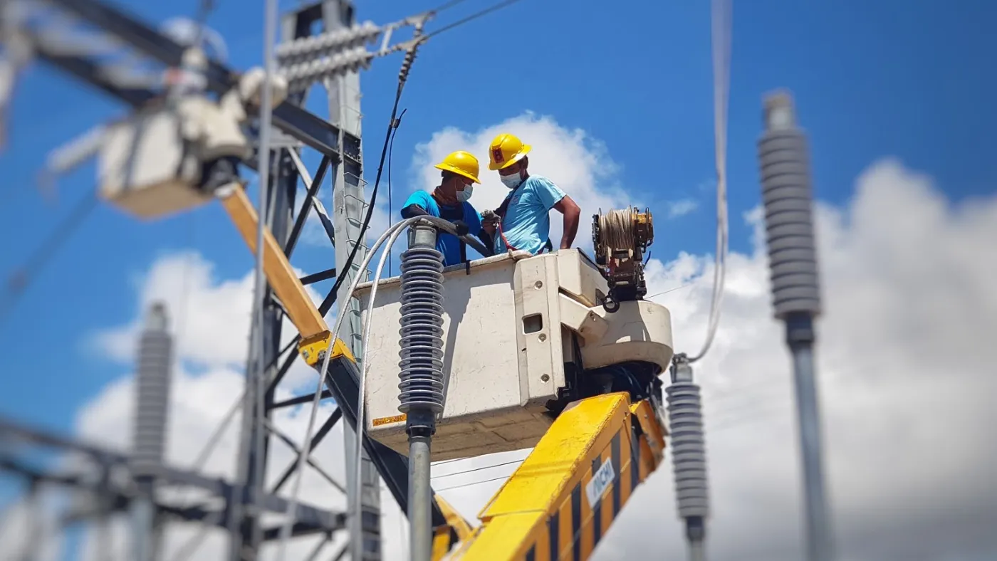 Meralco linemen working on power lines