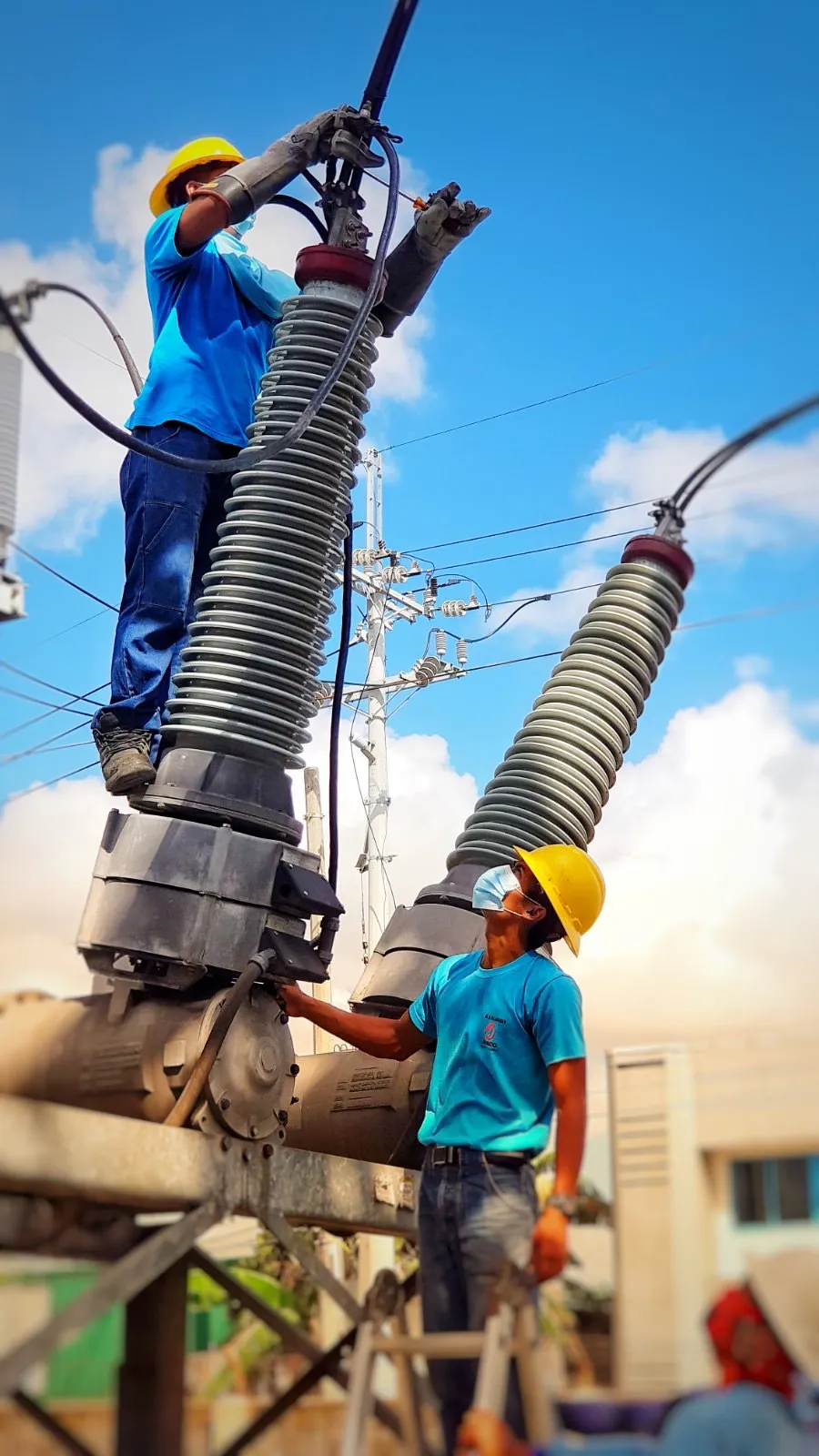 Meralco linemen working on power lines