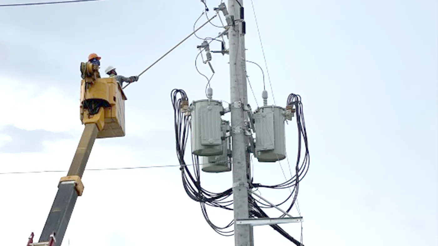 Meralco linemen working on power lines