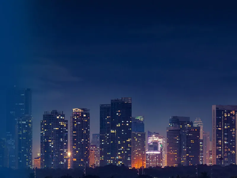 A bright, lit up cityscape at night