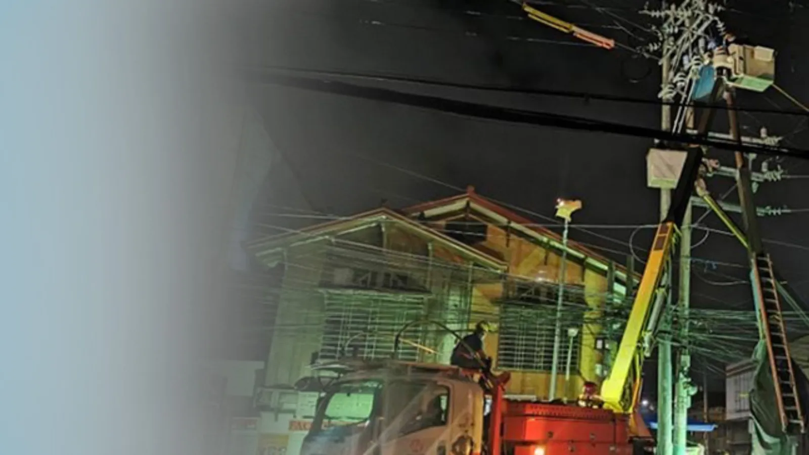 Meralco employees working on pole relocation