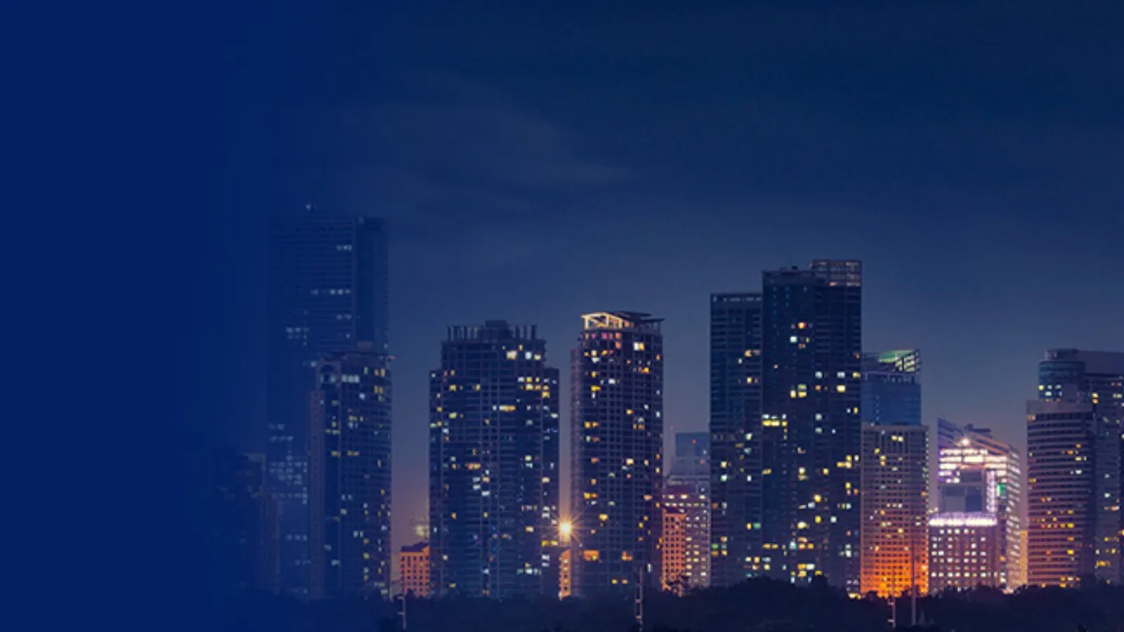 A bright, lit up cityscape at night