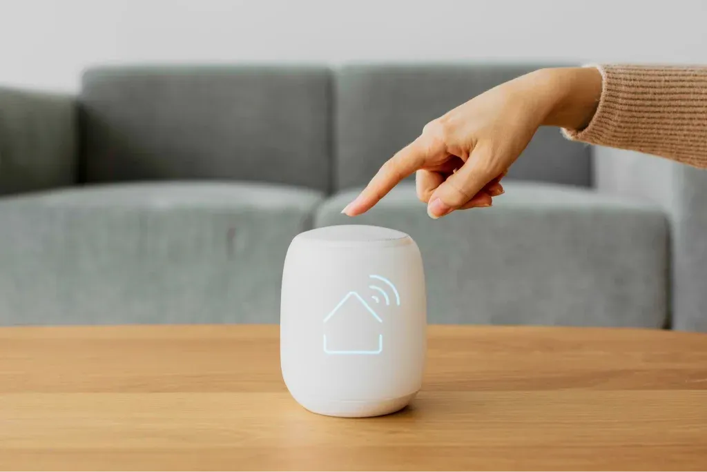 A homeowner uses a connected control to manage energy at home.
